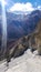 Tilicho Base Camp - A man crossing an land slid area in Himalayas