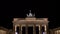 Tilt down 4K Video clip of people at night by The Brandenburg Gate, Pariser Platz, Berlin, Germany