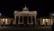 Tilt Down Clip of People at Night by The Brandenburg Gate, Pariser Platz, Berlin, Germany