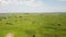 Tilt down shot of rolling hills and ranching farms