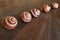 Tilt-Shift escargots on a wooden table.