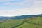 Tilt shift of green panorama tuscan hills on a sunny day landscape in italy