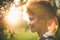 Tilt-shift portrait of black girl in front of sunset