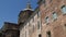 Tilt shot of Pavia Cathedral seen from Piazza Cavagneria, Italy