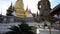 Tilt up of the buddha sculpture of giant in Grand Palace and Wat Phra Kaew