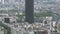 Tilt-up over Parisian cityscape with multiple houses and Tour Montparnasse