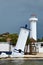 Tilted Faro Inclinado lighthouse in Puerto Morelos at the Malecon wooden pier on the Yucatan Peninsula in Mexico