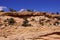 Tilted layers of sandstone cliffs