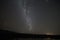 Tilted milky way with meteor in southern hemisphere dark sky