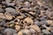 Tilted photo of gravel or pebble on the ground