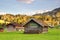 Timber barns under forests and mountains in Garmisch Germany