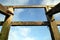 Timber breakwater structure on shingle beach, symmetrical shot a