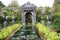 Timber carved fountain at the garden of Arundel Castle in England, Europe