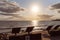 Timber Deck Chairs For Watching The Sun Rise Over The Ocean