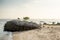 Timber fishing boats moored on the beach Penang