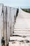 Timber groynes on the beach at the north sea