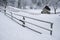 Timber House In Snowy Landscape