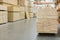 timber in warehouse. Pallet with boards in the hardware store. Packed boards in the building store. building materials. warehouse