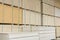 timber in warehouse. Pallet with boards in the hardware store. Packed boards in the building store. building materials. warehouse