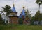 Timbered Orthodox chapel with gold domes