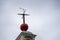 A time ball with weathervane sits atop the Octagon Room of Flamstead House at the Royal Observatory Greenwich, London England UK