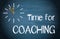 Time for Coaching - clock with text on blue background