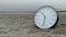 Time Concept, Clock On Sand Beach, Background Walking Couple Legs Sea Horizon