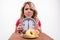 Time for diet slimming. Beautiful woman with clock