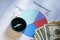 Time distribution diagram with compass and dollars