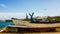 Time does not forgive: rowing boat and surfboard abandoned by the sea