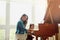 Time for a duet with Mom. a mother playing the piano with her adorable little daughter at home.