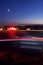 Time exposure shows car lights illuminating crosswalk at view point on Mount Tolmie overlooking Victoria