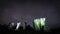 Time laps of star and milky way movement at night of cloudy sky above on Stonehenge