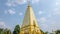 Time lapse of 4-sided shape pagoda : architecture landscape of white and gold pagoda at wat Phrathat Nong Bua in Ubon Ratchathani