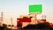 Time lapse advertising billboard green screen over Mexican house at sunset