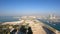 Time lapse aerial view of Skydive Dubai Palm Drop zone at JBR Beach with the runway environment