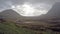 Time lapse of the amazing landscape of Glencoe with sun, rain, hail and rainbow