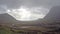 Time lapse of the amazing landscape of Glencoe with sun, rain, hail and rainbow