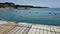 Time lapse barefoot feet on wooden flooring of seaside pier