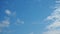 time lapse of beautiful blue sky with light clouds background. Natural autumn sky. Delicate hue paints the atmosphere