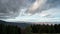 Time lapse with beautiful fast-moving clouds over the mountain slopes