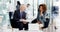 Time-lapse of businessman and businesswoman interacting with each other