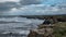 Time-lapse in cathedral beach with rugged coastline