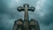 Time lapse of catholic stone cross displayed against dynamic gray clouds in motion