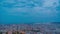 Time lapse city Barcelona Sunset with Moon in the sky