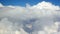 Time lapse clip of white fluffy clouds over sky