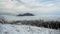 Time-lapse of cloud mass flow through a wide mountain valley