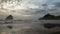 Time Lapse of Clouds Blue Sky and Crashing Ocean Waves with Haystack Rock in Cape Kiwanda Pacific City Oregon at Sunset 1080p
