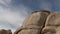 Time Lapse of Clouds and Desert Rocks - Clip 1