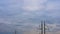 Time lapse clouds,Fluffy clouds,Time lapse sky with electric support pillars. Rainy cloudy sky with moving clouds, climate change